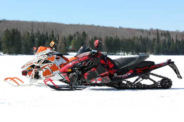 A Arctic Cat Procross snowmobile with a red and black video game Resident Evil Nemesis custom vinyl wrap.